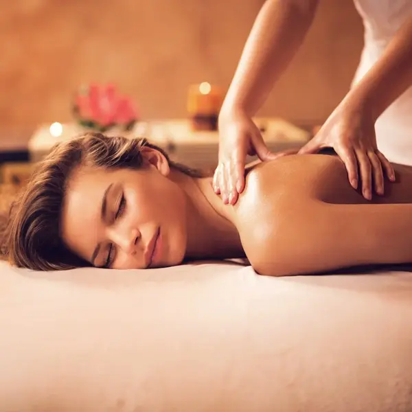 Customer enjoying Swedish Massage in Mysore at Isras Bali spa with relaxing ambiance